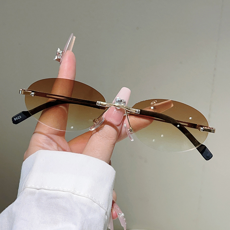 Rimless Oval Sunglasses Women  - огляд і ціна Designer Sunglasses